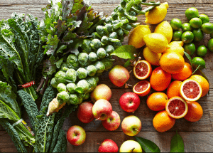 a group of fruits and vegetables on a wood surface Healthy Weight Loss Diets Shropshire